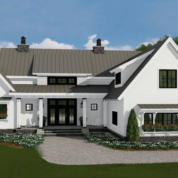 White home with black metal roof, dark-framed windows, porch and a gravel driveway.